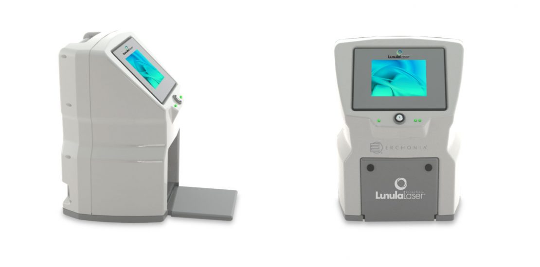 Patient's feet positioned in the Lunula laser during a treatment session